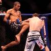 Jose Aldo knees Mike Brown during the World Featherweight Championship Wednesday at the Palms.  Aldo