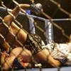 Jose Aldo punches Mike Brown during the World Featherweight Championship Wednesday at the Palms.  Al