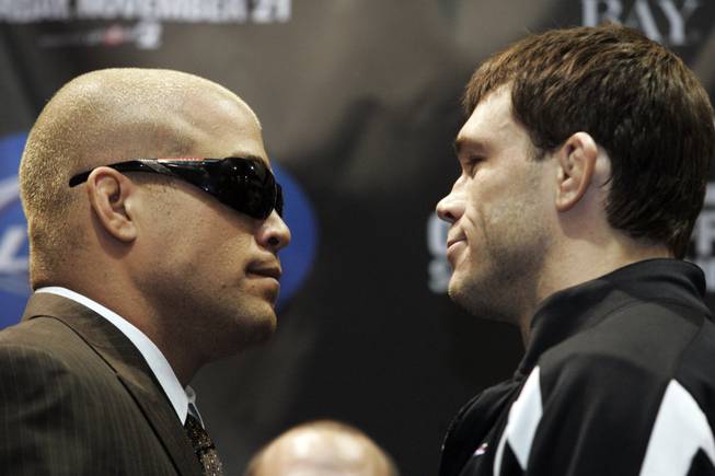 Tito Ortiz and Forrest Griffin face off at a news conference for UFC 106 Thursday, November 19, 2009.