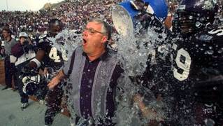 Dennis Franchione is drenched during the closing seconds of his TCU team's 28-19 victory over Southern Cal in the Sun Bowl on Dec. 31, 1998 in El Paso, Texas. Franchione, in one season, turned the Horned Frogs from a 1-10 WAC doormat to a perennial winner. Could he do the same for UNLV? Dennis Franchione is drenched during the closing seconds of his TCU team's 28-19 victory over Southern Cal in the Sun Bowl on Dec. 31, 1998 in El Paso, Texas. Franchione, in one season, turned the Horned Frogs from a 1-10 WAC doormat to a perennial winner. Could he do the same for UNLV?