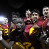 Del Sol junior Byron Stewart (32) celebrates with his Dragon teammates after defeating the Liberty Patriots in a Sunrise Regional semifinal on Friday night for a chance to play for a spot in the state championship for the first time in school history. Del Sol junior Byron Stewart (32) celebrates with his Dragon teammates after defeating the Liberty Patriots in a Sunrise Regional semifinal on Friday night for a chance to play for a spot in the state championship for the first time in school history.