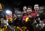 Del Sol junior Byron Stewart (32) celebrates with his Dragon teammates after defeating the Liberty Patriots in a Sunrise Regional semifinal on Friday night for a chance to play for a spot in the state championship for the first time in school history.