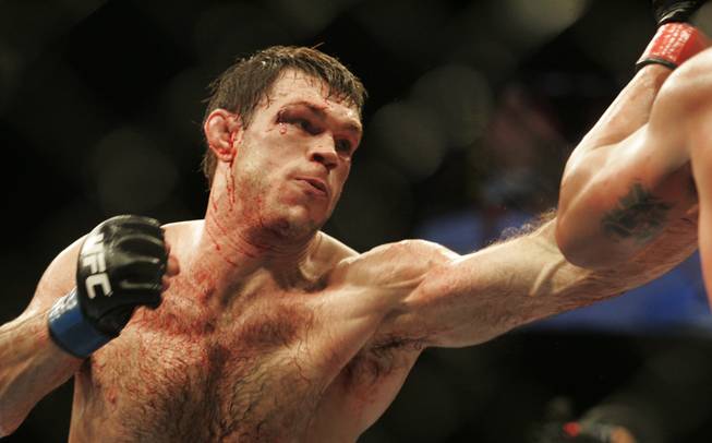 Forrest Griffin throws a left at Tito Ortiz during their light heavyweight bout at UFC 106 Saturday, Nov. 21, 2009, at the Mandalay Bay Events Center. Griffin won the bout by split decision.
