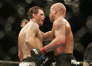 Forrest Griffin, left, and Tito Ortiz embrace following their light heavyweight bout during UFC 106 Saturday, November 21, 2009 at the Mandalay Bay Events Center. Griffin won the bout by split decision.