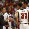 UNLV coach Lon Kruger talks with Oscar Bellfield, left, Tre'Von Willis (33), and Chace Stanback during a game against Southern Illinois at the Thomas & Mack Center Saturday. UNLV beat Illinois 78-69. UNLV coach Lon Kruger talks with Oscar Bellfield, left, Tre'Von Willis (33), and Chace Stanback during a game against Southern Illinois at the Thomas & Mack Center Saturday. UNLV beat Illinois 78-69.
