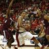 UNLV's Tre'Von Willis drives to the basket past Kevin Dillard, left, during a game against Southern Illinois at the Thomas & Mack Center Saturday. Gene Teague watches at right. UNLV beat Southern Illinois 78-69.