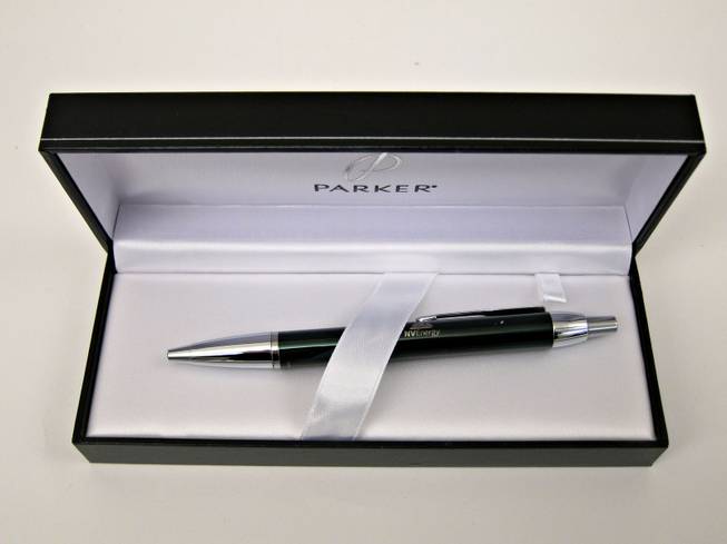 104. Black Parker pen with NV Energy logo on it in a black gift box.  