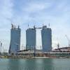 An undated handout photo shows the lifting of the steel structural pieces of the Sands SkyPark to th