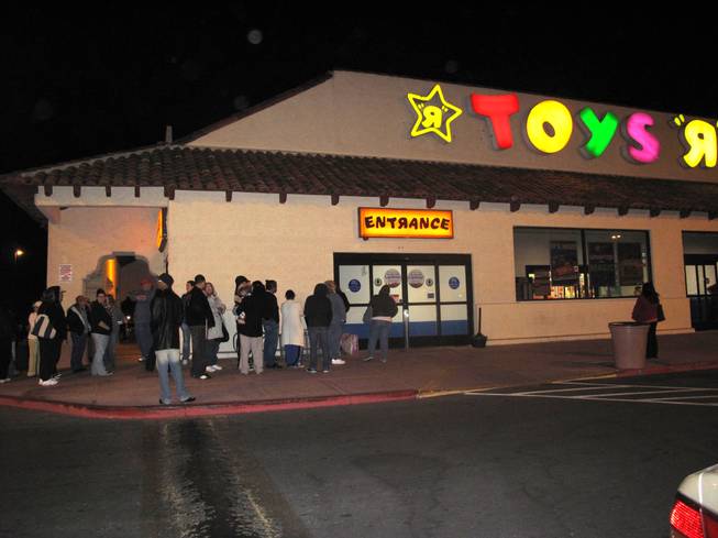 People line up at Toys R Us, 4000 Maryland Parkway, at midnight on Black Friday.