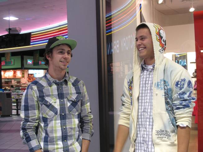 Anthony Lotta, 19, and David Savage, 19, laugh while shopping ...