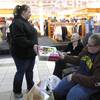Sisters Laura Corsaro and Julie Terry shop with their mom, Pam Terry, at the Las Vegas Outlet Center on Black Friday.