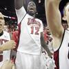 UNLV players Derrick Jasper, left, Brice Massamba, center, and Kendall Wallace celebrate after upsetting 16th-ranked Louisville Saturday at the Thomas & Mack Center. The Rebels won the game 76-71. UNLV players Derrick Jasper, left, Brice Massamba, center, and Kendall Wallace celebrate after upsetting 16th-ranked Louisville Saturday at the Thomas & Mack Center. The Rebels won the game 76-71.