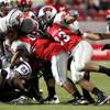 The UNLV defense smothers San Diego State running back Brandon Sullivan during Saturday's game at Sam Boyd Stadium.
The UNLV defense smothers San Diego State running back Brandon Sullivan during Saturday's game at Sam Boyd Stadium.