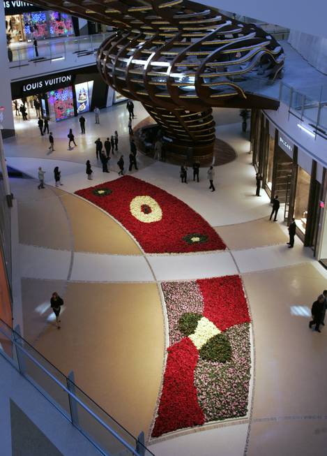 A bed of flowers accents the floor of Crystals, the ...