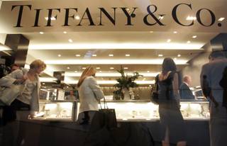 Invited guests examine the offerings at Tiffany & Co.'s 10,000-square-foot, two-level store at Crystals in City Center.