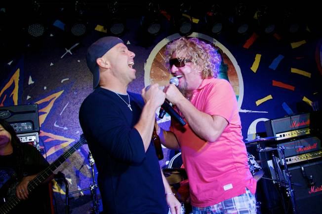 Kenny Chesney and Sammy Hagar duet at Sammy's grand opening of Cabo Wabo Cantina at Planet Hollywood's Miracle Mile on Dec. 4, 2009.