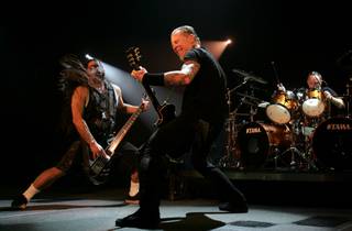 Metallica bassist Robert Trujillo, left, and guitarist James Hetfield perform during their sold-out show at the Mandalay Bay Events Center Saturday, December 5, 2009.