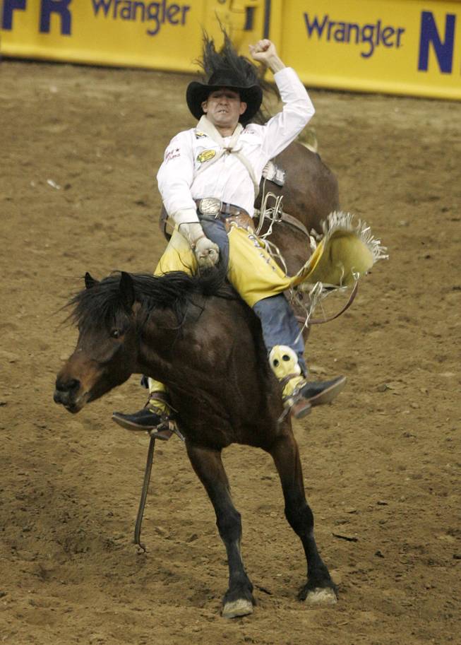 Bareback rider Bobby Mote competes in the 10th and final go round of the 2009 National Finals Rodeo Saturday, Dec. 12, 2009, at the Thomas & Mack Center. Mote finished first and won the championship outright.