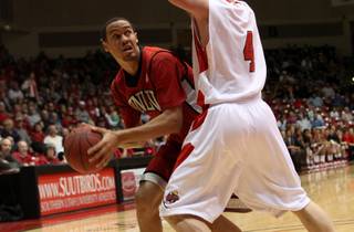UNLV forward Chace Stanback looks to score against Jake Nielson Tuesday as the Rebels take on Southern Utah at the Centrum Arena in Cedar City, Utah. UNLV dominated the second half and came out with a 77-59 win.
