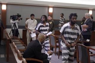 From left to right, Saul Williams Jr., Quadrae Scott, Prentice Marshall, Michael Ferguson, Emmitt Ferguson and Adrian Pena appear in District Court during an initial arraignment at the Regional Justice Center on Wednesday, Dec. 23, 2009. The defendants entered not guilty pleas to charges related to the slaying of Metro Police officer Trevor Nettleton last month.