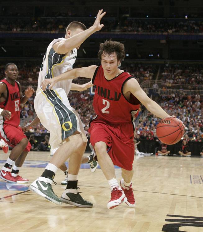 Point guard Kevin Kruger looks for dribbling room against Oregon during the 2007 Sweet 16.