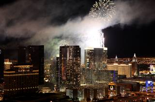 Fireworks ring in the new year on the Las Vegas Strip on Jan. 1, 2010. The Strip's newest casino, Aria, was one of seven casino rooftops that lit up the midnight sky with fireworks. 