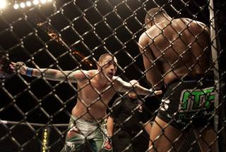 Thaigo Silva taunts Rashad Evans during the third round of their light heavyweight fight at UFC 108 on Saturday at the MGM Grand Garden Arena. Evans won a three-round unanimous decision over his Brazilian opponent to extend his record to 19-1-1.