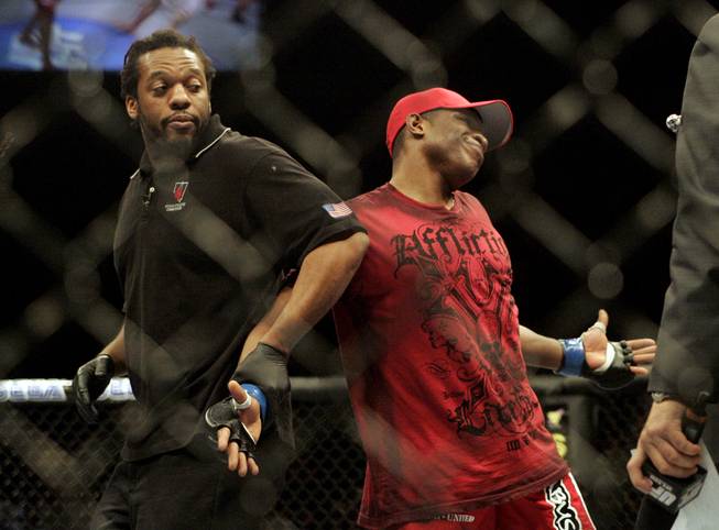 Paul Daley is pulled away from Dustin Hazelett's corner by Herb Dean at UFC 108 on Jan. 2, 2010 at the MGM Grand Garden Arena . Daley won by knockout in the first round.