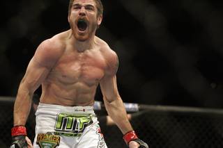 Jim Miller celebrates his victory over Duane Ludwig during UFC 108 at the MGM Grand Garden Arena. Miller won by submission in the first round.