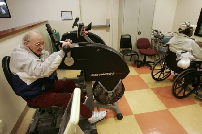 Vincent Cravero, above, uses an exercise machine at the facility last week. 