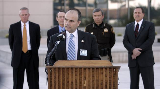 FBI special agent in charge Kevin Favreau speaks at a news conference outside the George Federal Building Tuesday, January 5, 2010 about the previous day's shoot out that killed a court security officer and the gunman and injured a deputy U.S. marshall.