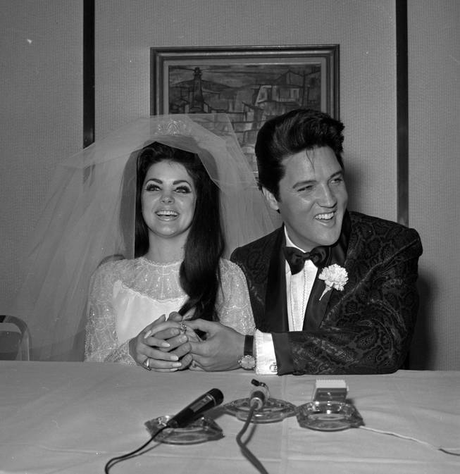 Priscilla and Elvis Presley at their wedding at the Aladdin.
