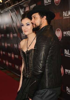 Sasha Grey and her husband, Iann Cinnamon, a man who Dave Attell referred to as, "a drug dealer from the '70s."