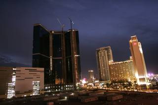 The Fontainebleau, construction stopped, is seen dark along the Strip. 