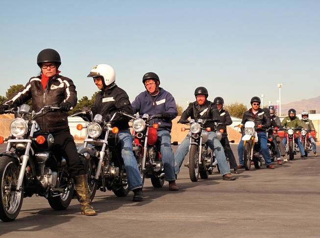 The Dobermen Motorcycle Club revs its engines.