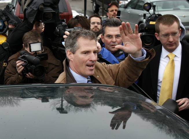 Massachusetts State Sen. Scott Brown, R-Wrentham, waves to supporters after voting in Wrentham, Mass., Tuesday, Jan. 19, 2010. 