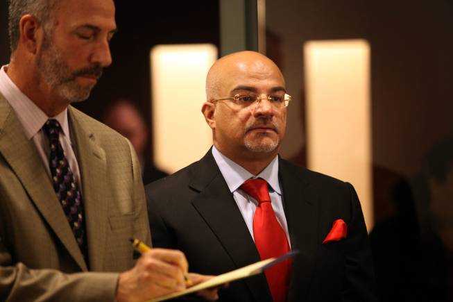 Jean Marc Eljwaidi, right, appears in court with attorney Steven Wolfson at the Regional Justice Center in Las Vegas on Jan. 21, 2010. 