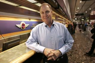 Southwest Airlines President and CEO Gary Kelly is seen at his company's ticket counter at McCarran International Airport Monday, February 1, 2010.