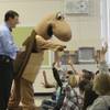 Meteorologist Nate Tannenbaum and Mojave Max ask questions of students during the Mojave Max Emergence Contest assembly Tuesday morning at Kitty Ward Elementary School.