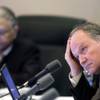 Regent Michael Wixom, right, listens to budget-cutting options during a Board of Regents meeting Tuesday at the College of Southern Nevada.