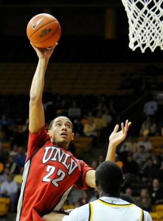 UNLV forward Chace Stanback puts up a shot against Wyoming during Wednesday's game in Laramie, Wyo.