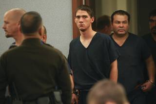 Nathan Hardy, center, looks toward his family while entering the courtroom for his bail hearing before Justice of the Peace William Jansen on Feb. 5 at the Regional Justice Center.  Hardy is accused in a Jan. 29 crash that killed Maria DelCarmen Lewis, 45, and her son, Daniel Santos, 17, a student at Canyon Springs High.