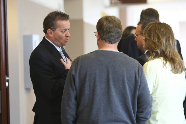 Attorney Gary Guymon, left, speaks with the family of Nathan Hardy after Justice of the Peace William Jansen set his bail at $50,000 Friday at the Regional Justice Center. Hardy is accused in a Jan. 29 crash that killed Maria DelCarmen Lewis, 45, and her son, Daniel Santos, 17, a student at Canyon Springs High.