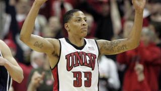 UNLV guard Tre'Von Willis signals another 3-point shot during the first half of their game against BYU Saturday, Feb. 6, 2010.