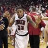UNLV guard Tre'Von Willis is congratulated by fans on Saturday as he exits the court at the Thomas & Mack Center following the Rebels' 88-74 victory against BYU. Willis had a career-high 33 points.