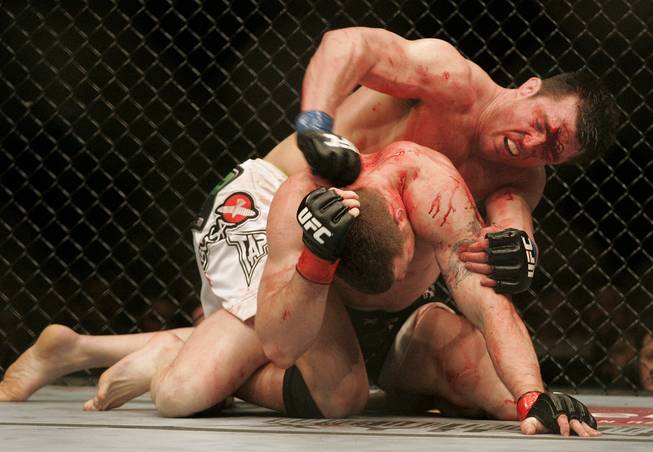 Chael Sonnen hits the back of Nate Marquardt's head during their middleweight bout at UFC 109 Saturday, Feb. 6, 2010, at the Mandalay Bay Events Center. Sonnen won by decision.
