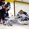 Idaho netminder Rejean Beauchemin stops a shot from Wrangler forward Justin Bernhardt as the Wranglers and Steelheads met for the third time in three nights at the Orleans Arena on Saturday.