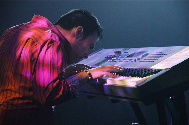 Freddie Ravel, deep into the keyboard while performing with Santa Fe and the Fat City Horns.