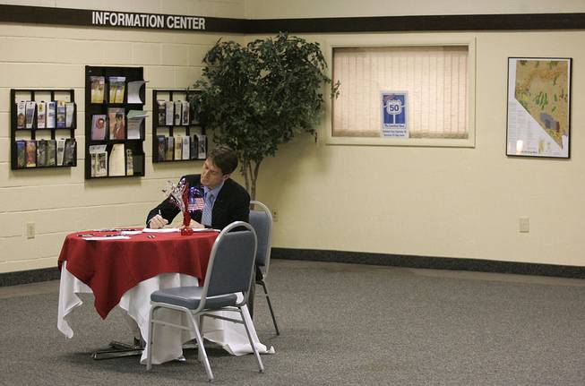 Senate candidate John Chachas tweaks his speech during dinner at the convention center in Fallon on a swing through Northern Nevada on the Lincoln Day dinner circuit Saturday, Feb. 20, 2010.