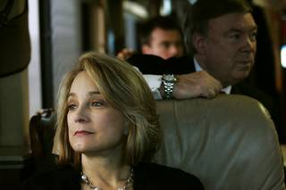 Senate candidate Sue Lowden looks out the window while she and her husband Paul Lowden travel on her campaign bus to a Lincoln Day dinner in Minden Sunday, February 21, 2010.